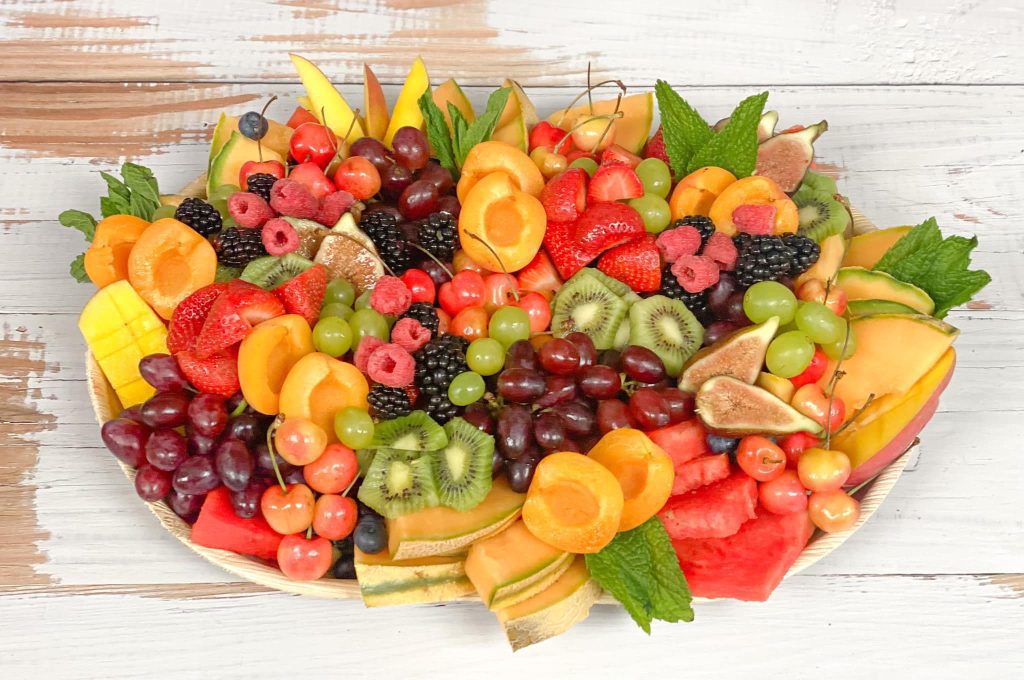 fruit board filled with mixed fruits